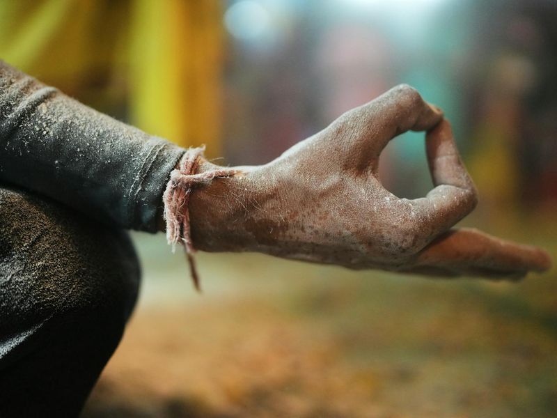 Detailed close-up of yoga practitioner hands in mudra